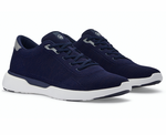 The Peter Millar Glide V3 Sneakers, in navy blue with white soles, feature mesh fabric uppers, a performance mesh sockliner for flexible comfort, and lace-up closures. Shown side by side on a plain background.