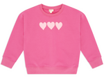 The Feather 4 Arrow Baby Girls’ and Girls’ Weekend Sweatshirt features a trendy puff print design with three light pink heart shapes across the chest.