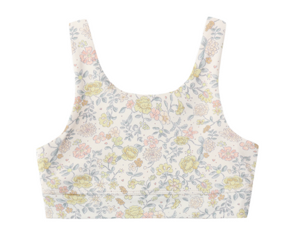 The Rylee & Cru Girls' Swift Sports Top features a scoop neck and citron bloom print, with yellow, pink, and blue flowers and green leaves on white—a pastel floral design perfect for a subtle statement.