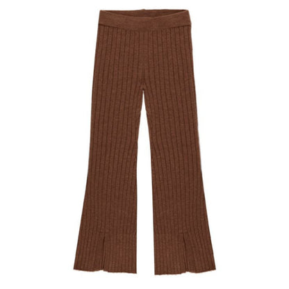 The Girls' Flare Knit Pant by Rylee & Cru features a wide elastic waistband, slight flare at the bottom, and small front side slits on each leg.