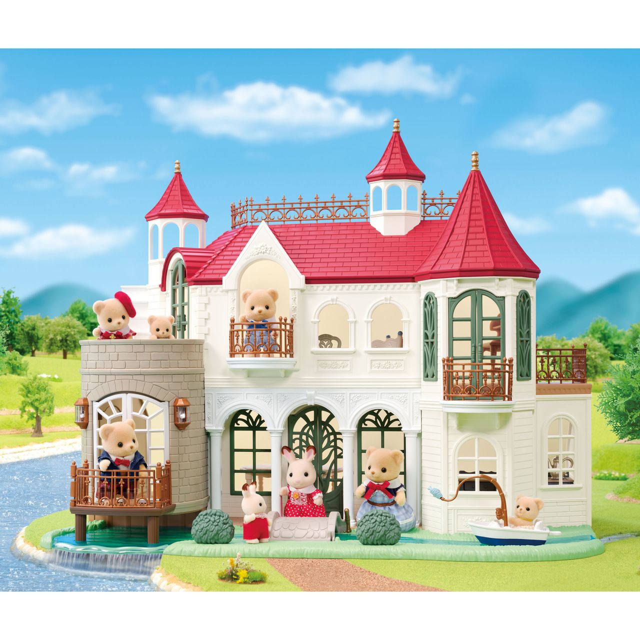 The Calico Critters Red Roof Riverside Manor is a white, castle-style house with red roofs, featuring charming animal figurines posed in the windows, on balconies, and throughout the yard surrounded by greenery and a river beneath a blue sky.