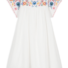 The Girls' Daya Dress by Louise Misha features a white cotton construction with colorful floral embroidery on the bodice, short sleeves, and a flowing skirt for an effortlessly charming look.