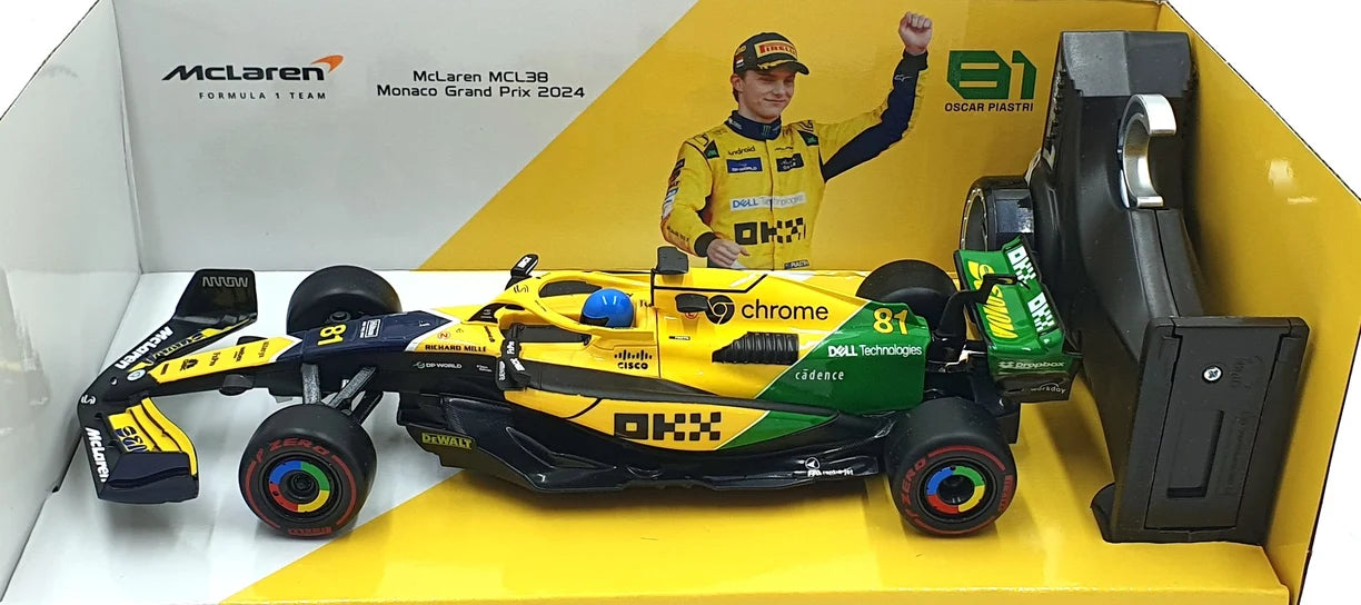 Experience the excitement of Formula 1 with the Maisto R/C 1:24 McLaren MCL38 (2024) - #81, a detailed replica featuring the iconic yellow and green livery from the Monaco Grand Prix. This model comes complete with a cardboard cutout of Oscar Piastri in a matching racing suit, making it an essential addition for fans or collectors. Celebrate McLaren’s 2024 season and its talented driver—perfect as a display piece or to accompany your existing Formula 1 remote control car collection.