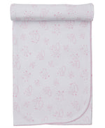The Kissy Kissy Cheerful Good Night Printed Blanket is a light pink, cozy baby blanket featuring clouds, moons, stars, and rainbows. It’s rolled at one end with stitched edges for a soft, charming look.