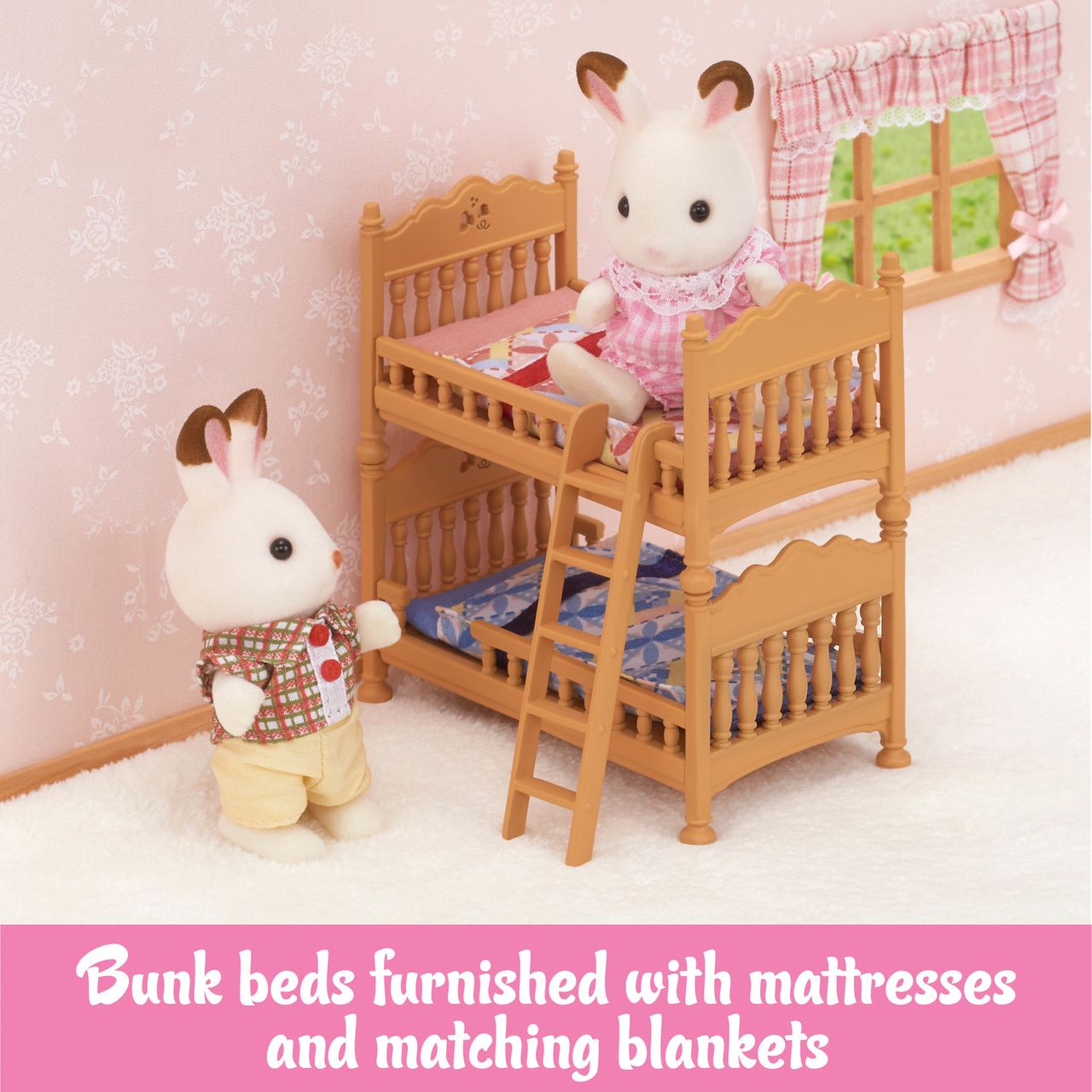 Two toy rabbits stand beside wooden bunk beds with ladders—a delightful Children’s Bedroom Set from Calico Critters—featuring mattresses and blankets, all in a pink room adorned with floral wallpaper and a window, making it ideal for dollhouse furniture fans.