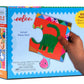 A box of Eeboo’s Learn the Alphabet 20 Piece Puzzle, showing ABC-themed pieces with a hand holding a green dinosaur puzzle piece and the actual size displayed.