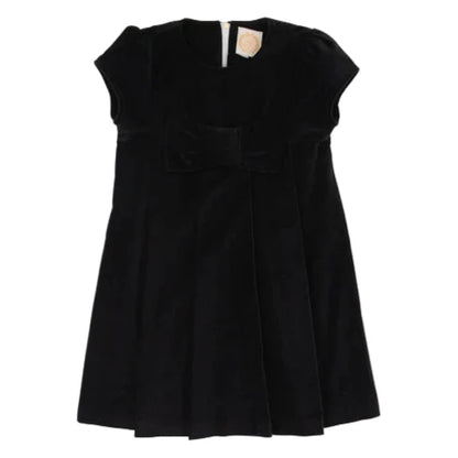 The Beaufort Bonnet Company’s Girls' Velveteen Darcy Dress features short sleeves, a black velveteen finish, a front bow detail, and back zipper closure, shown against a white background.