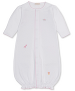 The Kissy Kissy Baby SCE Jungle Hang Out Convertible Gown is made from soft white Peruvian cotton and features long sleeves, pink trim, and delicate embroidery of jungle animals like a lion, giraffe, and elephant. Designed for easy changing, this infant gown includes an elasticized bottom and a convenient front opening.