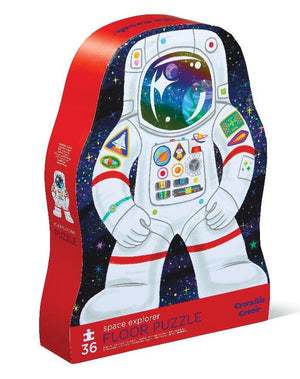 Box shaped like an astronaut in a spacesuit with a starry background, labeled "36 Piece Space Explorer Puzzle" by Crocodile Creek. Contains 36 pieces.