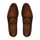 A pair of Magnanni Destin Cognac Suede men's contemporary loafers, featuring a braided strap detail, viewed from above.