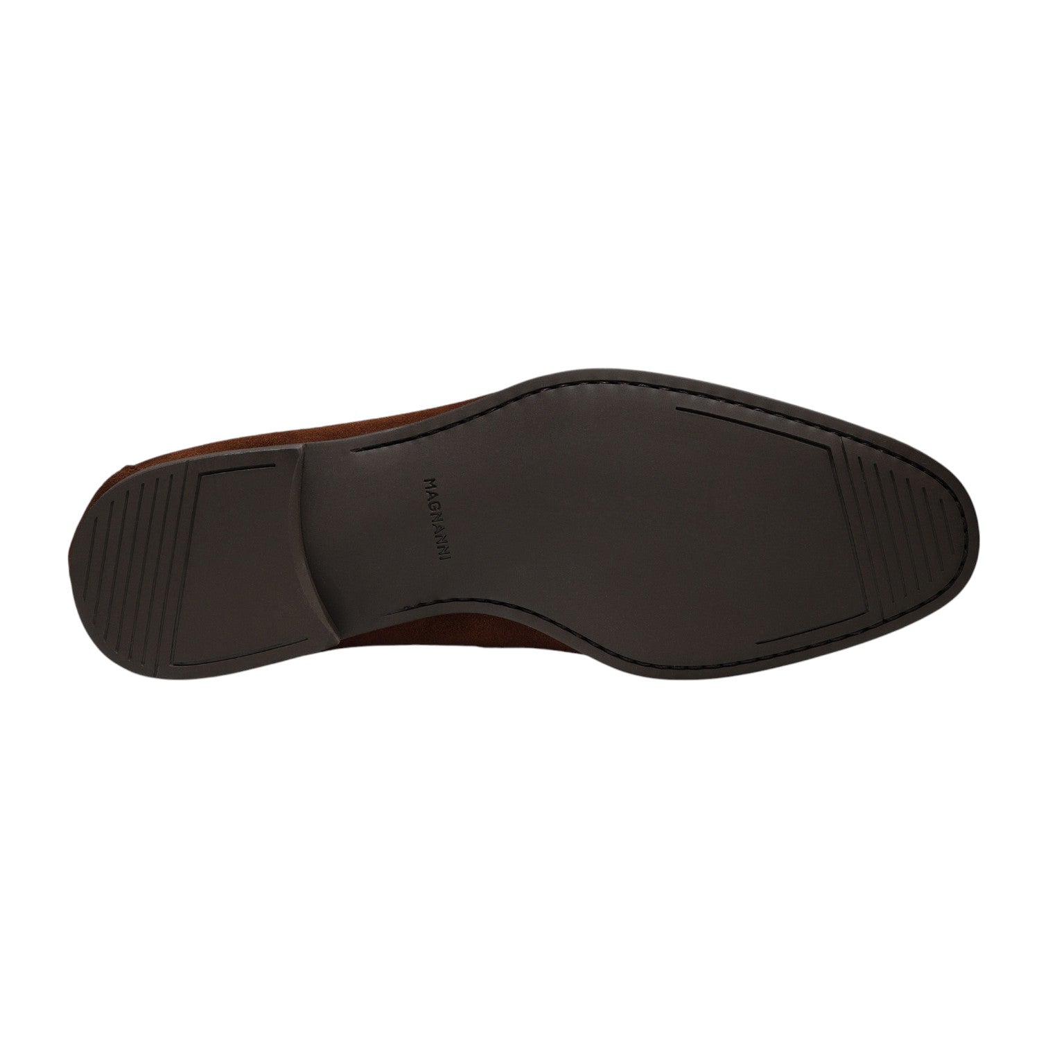 The image shows the bottom view of Magnanni’s Destin Cognac Suede dress shoe, featuring a comfortable black rubber sole with textured areas at the heel and toe.