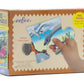 The eeboo Dinosaur Land 20 Piece Puzzle by Eeboo, measuring 11" x 15", features a hand holding a plesiosaur piece to show the "Actual Piece Size." It's ideal for improving hand-eye coordination while delving into a colorful prehistoric setting.