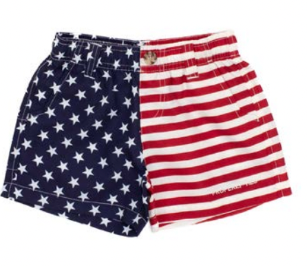 The Boys' Mallard Short by Properly Tied features quick-dry, moisture-wicking fabric with a bold American flag design: blue and white stars on one side, red and white stripes on the other.