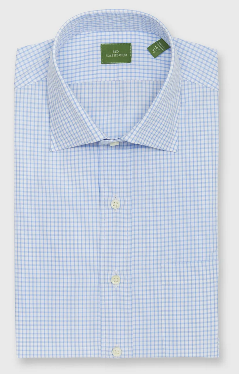 The Sid Mashburn Spread Collar Dress Shirt is a light blue and white checkered poplin shirt with a spread collar, white buttons, and a green label on the inside collar.