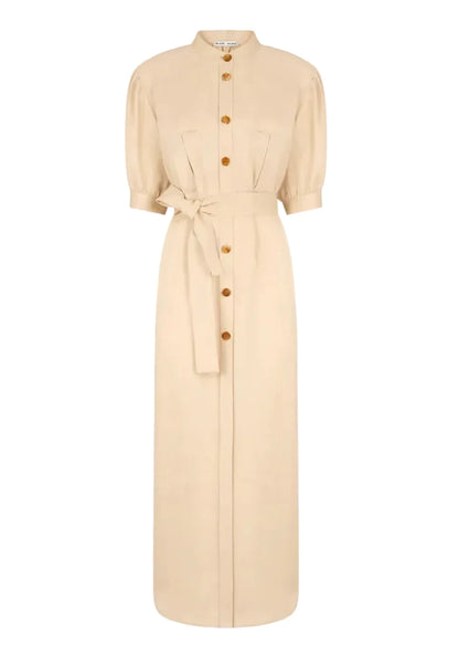 The Donzi Berber Long Dress by Blaze Milano is a beige, safari-inspired long dress featuring short sleeves, a mandarin collar, front buttons, a fitted waist tie belt, and two chest pockets.