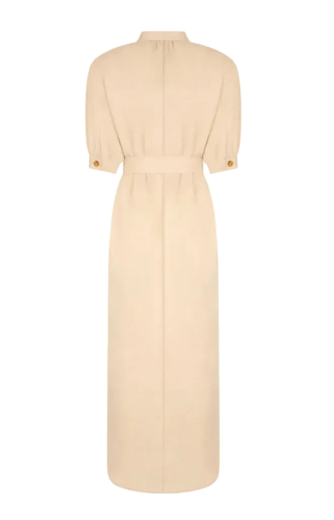 The Donzi Berber Long Dress by Blaze Milano is a beige, collar-neck, short-sleeve safari dress with buttoned cuffs, a defined waist, and a straight floor-length skirt in viscose hemp blend, shown from the back.