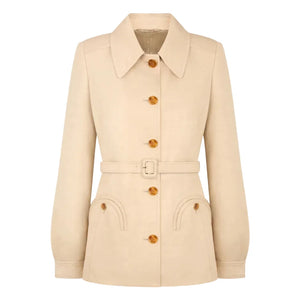 The Donzi Paint Jacket by Blaze Milano is a beige belted jacket with button closure, large collar, long sleeves, and two front flap pockets—a modern update of the classic hunting jacket inspired by Blaze Milano’s signature style.