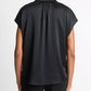 A person is shown from the back wearing the vince Cap Sleeve Silk Blouse in black and black pants against a plain white background.