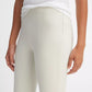A person is shown from shoulders to mid-thigh against a plain background, wearing a white ribbed tank top and the Bobbi Mid Rise Pant by vince, crafted from a luxurious Italian cotton-blend ponte fabric.
