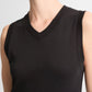 A model showcases the vince High V-Neck Shell Tank, a sleeveless black top crafted from soft Pima cotton, photographed from shoulders to mid-torso against a plain background.