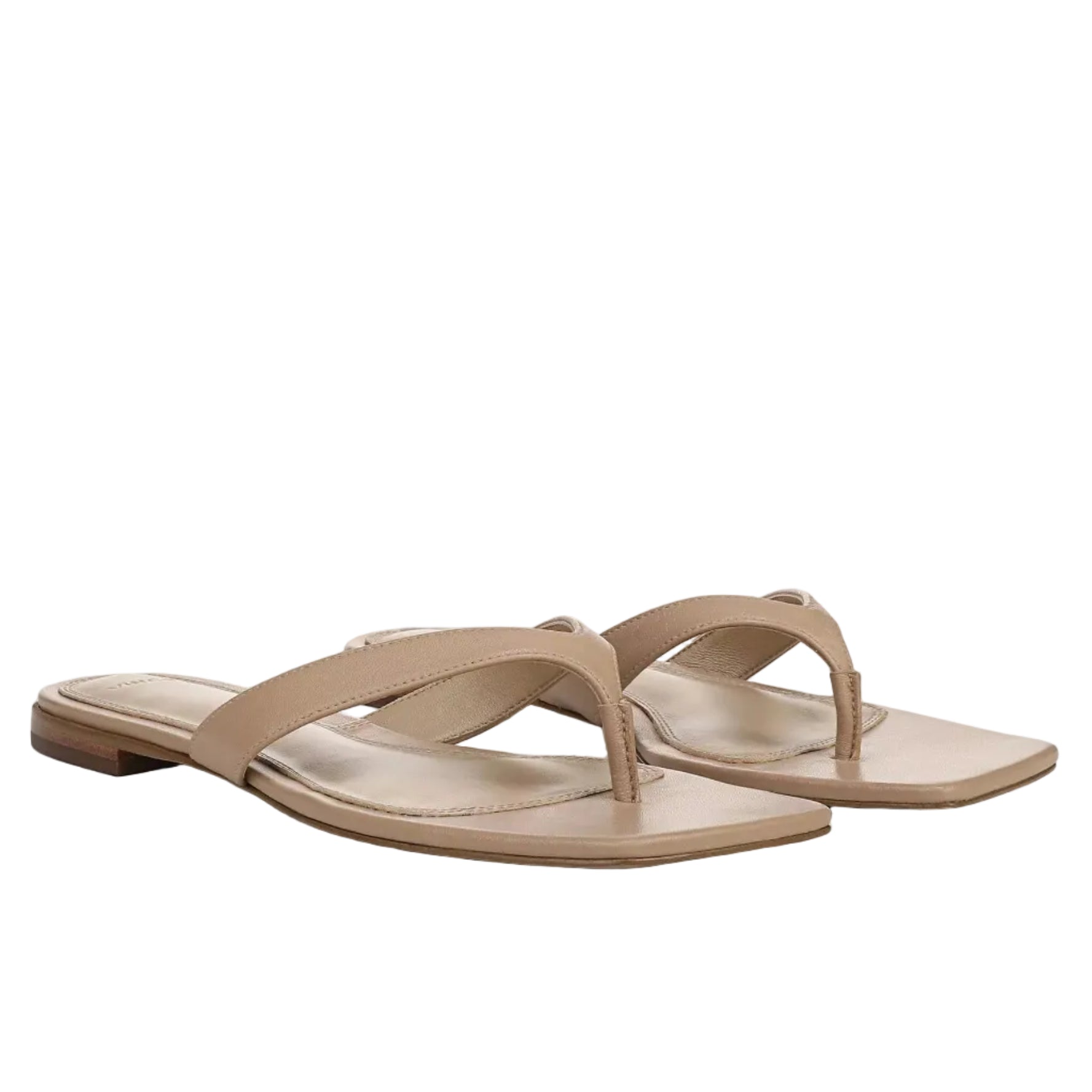 The Vince San Juan Leather Thong Sandal is shown on a white background, featuring beige leather with thin straps, square toes, and a padded footbed.