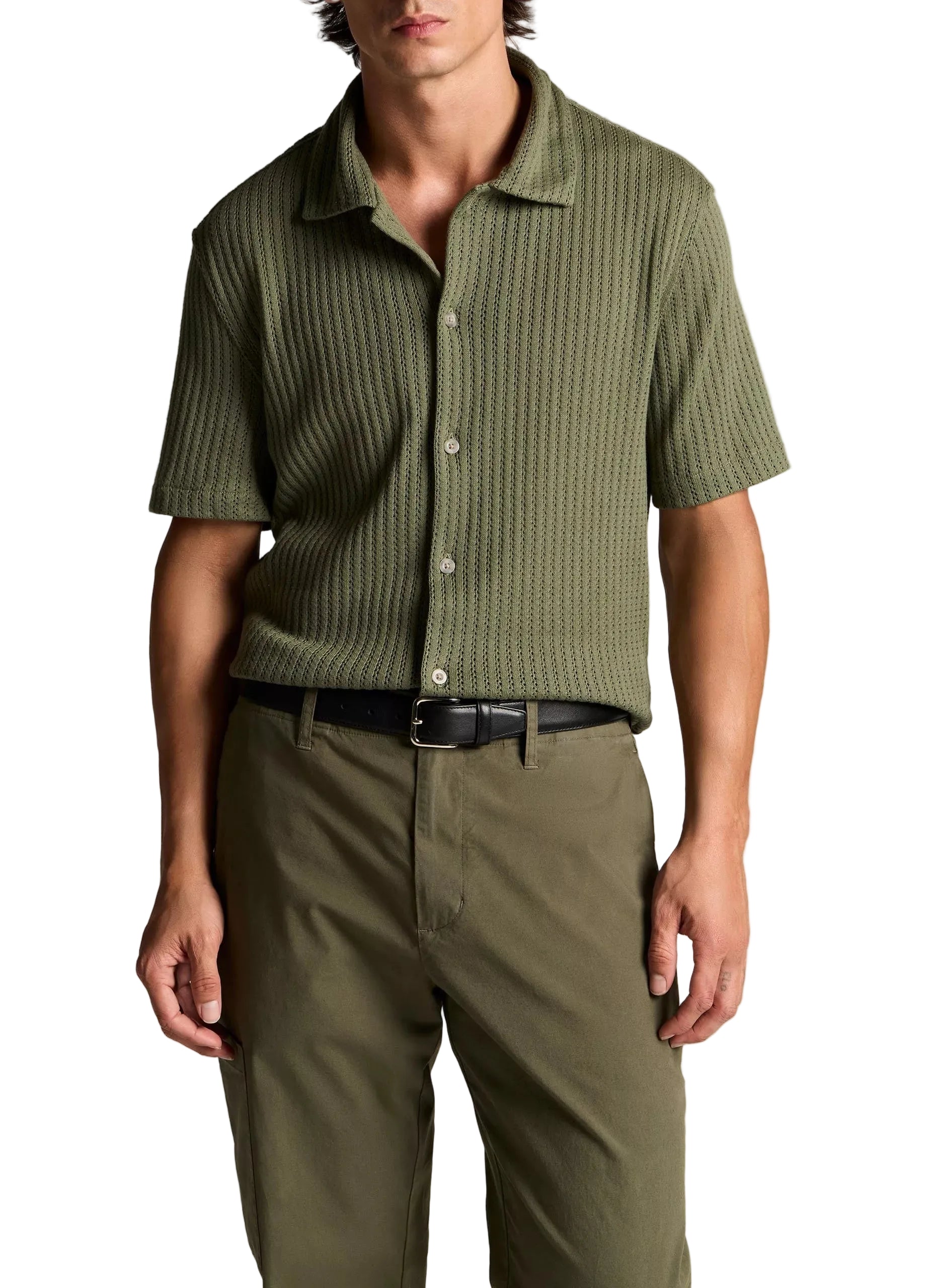 A man is wearing the vince Pointelle Short Sleeve Button Down in olive green with khaki pants, standing with his arms relaxed at his sides.