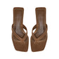 The Vince San Juan Suede Heeled Thong Sandal features a brown suede upper, square toe, and low kitten heel, shown from above against a plain white background.