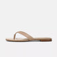 The Vince San Juan Leather Thong Sandal is shown from the side against a plain white background, featuring tan leather straps, a low wooden heel, and a padded footbed.