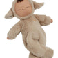 A cozy stuffed animal, dressed in a garment, resembling a beige lamb named pip by Olli Ella.