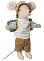 Maileg’s Hiker Mouse, Big Brother - Stripes features an adorable mouse dressed in a striped shirt, brown shorts, a hat, and a green backpack with arms outstretched—a charming addition to any hiker collection.
