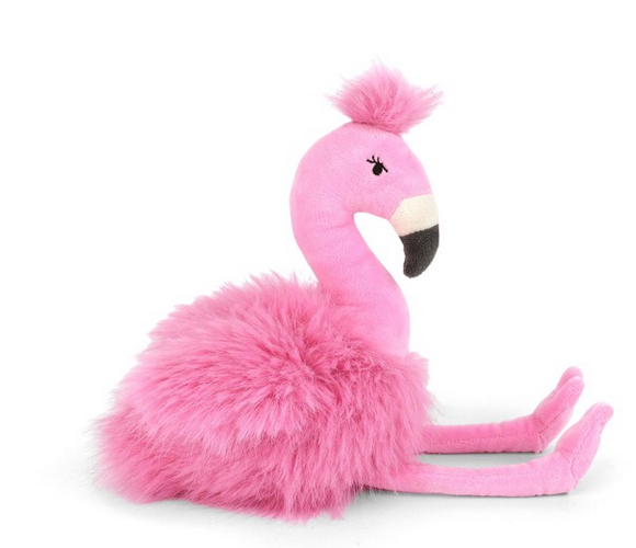 The Mon Ami Zinnia Flamingo is a pink stuffed animal with a fluffy body and long legs, designed to sit upright on a white background.