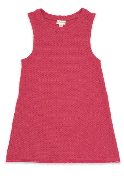 Feather 4 Arrow’s Girls’ Island Escape Dress, a sleeveless pink textured cotton dress with a round neckline, is laid flat on a white background. The visible label inside the collar highlights its authenticity, making it perfect as a stylish beach dress for sunny days.