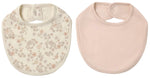 Here’s a rewritten version using the provided product data: The Quincy Mae Jersey Snap Bib, 2-Pack features two baby bibs side by side: one made from soft brushed jersey with a charming floral print on a cream background, and the other in a solid pale pink. Both bibs are designed with convenient snap closures at the back of the neck for easy dressing.