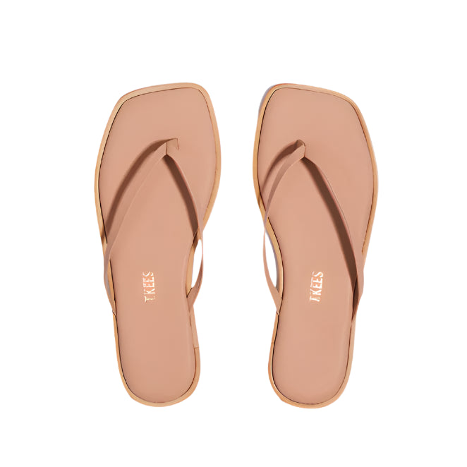 A pair of tan Dylan Sandals by Tkees, featuring square toes and thin straps, handcrafted from Brazilian leather and shown from above on a white background.
