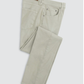 The Johnnie-O Atlas 5-Pocket Pant, in light beige, is crafted from garment-dyed stretch twill. Ideal for warmer climates, these lightweight pants feature visible pockets and button details on a plain background.