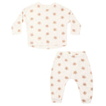 Introducing the Rylee & Cru Baby Girls’ Long Sleeve Tee + Pant Set: this cream-colored two-piece outfit is made from soft cotton jersey and features a coordinating long-sleeve tee and slouch pants, both decorated with a subtle light brown floral pattern and presented against a white background.