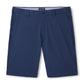 The Peter Millar Matlock Seersucker Performance Short in navy, knee-length with belt loops, front pockets, and a button closure is shown laid flat on a white background.