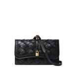 The Stella McCartney Stella Woven Ryder Wallet with Strap is a black woven leather crossbody featuring a flap closure, gold padlock detail, and an adjustable strap.