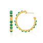 The Juliska Capucine De Wulf Berry Gem Medium Hoop Earrings feature gold hoops with green accents around the edge, shown from front and side on a white background—an elegant, feminine jewelry addition to your look.