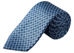 The Eton Geometric Woven Silk Tie, featuring a sophisticated blue jacquard weave with white and navy geometric patterns, is elegantly displayed rolled up on a white background—an ideal accessory to elevate any formal occasion.