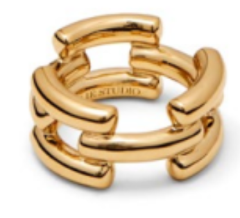 The Emily Ring by Lie Studio is a bold, gold chunky ring featuring an openwork link-style design with two rows of curved bars, forming a wide statement band that creates the coveted chunky look.