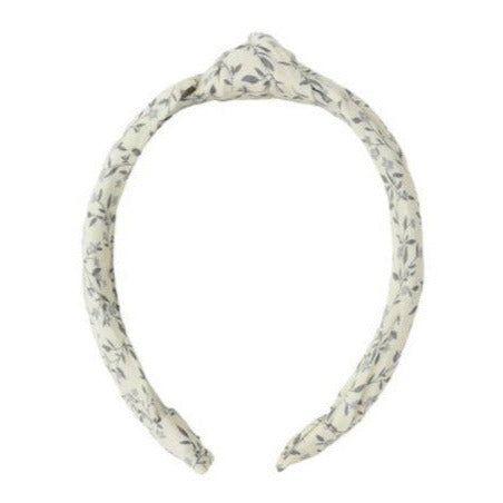 Rylee & Cru Knotted Headband in white with a subtle leaf pattern and top knot adds a stylish touch to any look; shown on a plain white background.