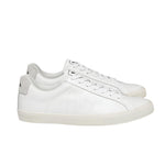 The VEJA Esplar Leather Women's Sneaker by Veja features white lace-up design, subtle logo on the side, gray detailing on the heel, and stitched suede accents.