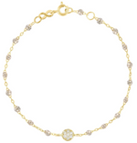 The Gigi Clozeau Puce Diamond Bracelet 6.7" from Gigi Clozeau features 18 carat gold, a diamond cluster centerpiece, and elegant bead accents.