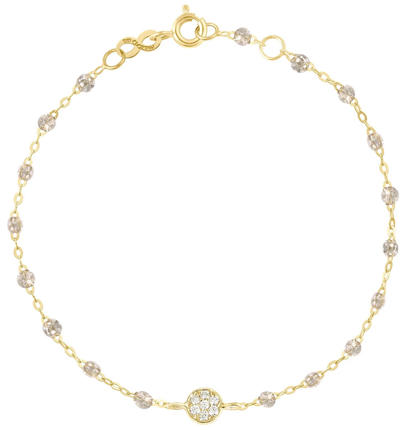 The Puce Diamond Bracelet 6.7" by Gigi Clozeau is crafted from 18-carat gold and features small, round diamond accents with a central diamond cluster. It includes a clasp closure and adjustable links for a perfect fit.