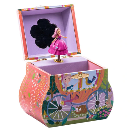 Introducing the Fairy Tale Carriage Jewelry Box by Floss and Rock—a beautifully decorative piece shaped like a magical carriage, featuring a charming ballerina figurine inside, a small mirror under the lid, and vibrant illustrations on the exterior. This enchanting jewelry box comes elegantly gift boxed, making it the perfect present for any special occasion.