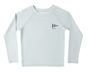 The Rylee & Cru Baby Boys' and Boys' Long Sleeve Rashguard is light gray with a small navy striped pennant and "R.C." on the left chest. It offers UPF 50+ protection, ideal for beach play, and is shown on a plain white background.