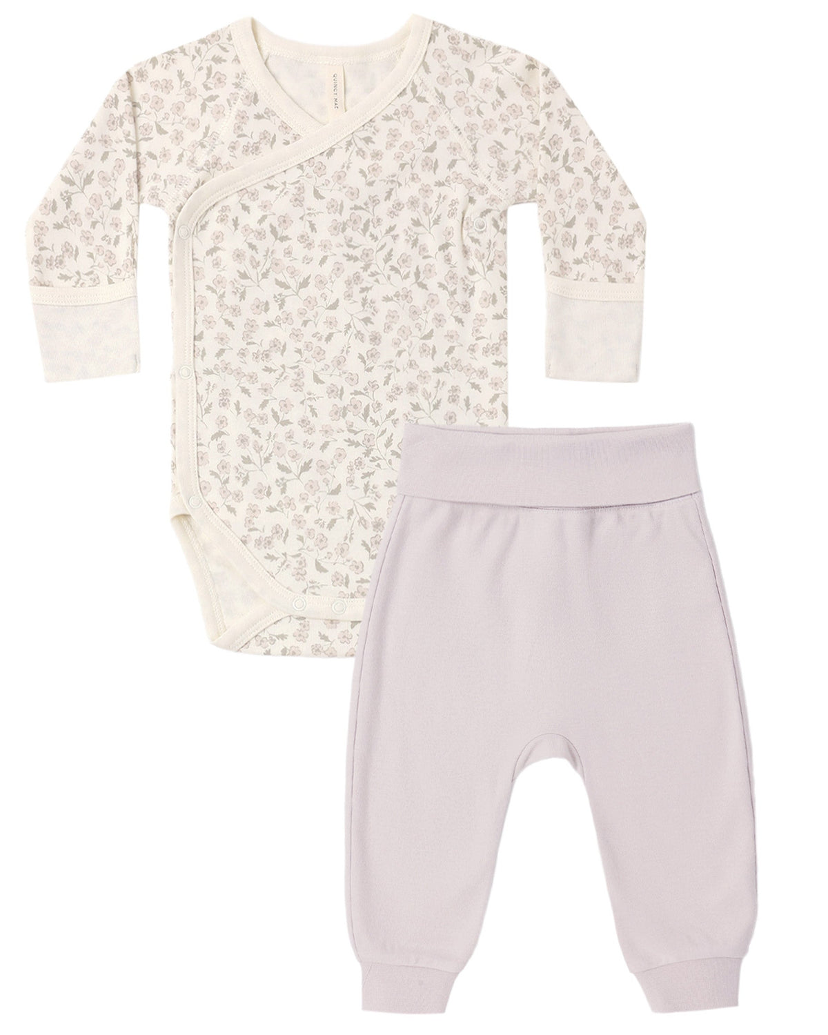Quincy Mae Baby Side Snap Bodysuit + Pant Set featuring a long-sleeve floral side-snap bodysuit and solid light purple footed pants.