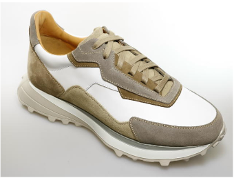 The Magnanni Onyx Sneaker showcases beige, white, and tan suede and leather panels, a chunky sole, beige laces, and a luxury design—displayed on a clean white background.