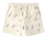 Rylee & Cru Baby Boys' and Boys' Boardshort in beige, with blue, red, and white sailboat pattern and drawstring waist. Provides UPF 50+ sun protection—stylish and comfortable swimwear.